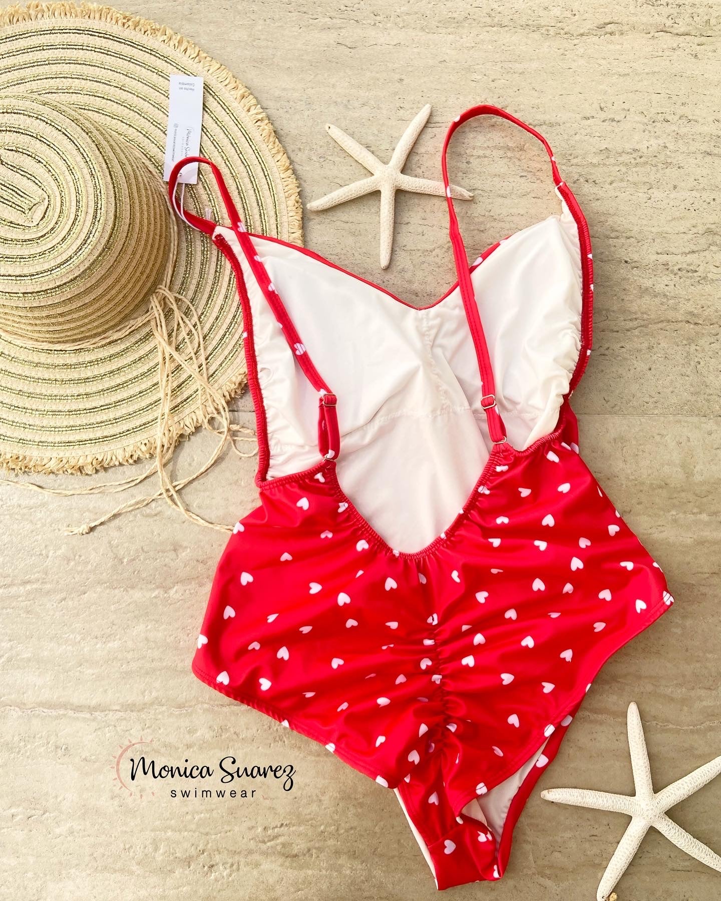 Enterizo corazones rojos